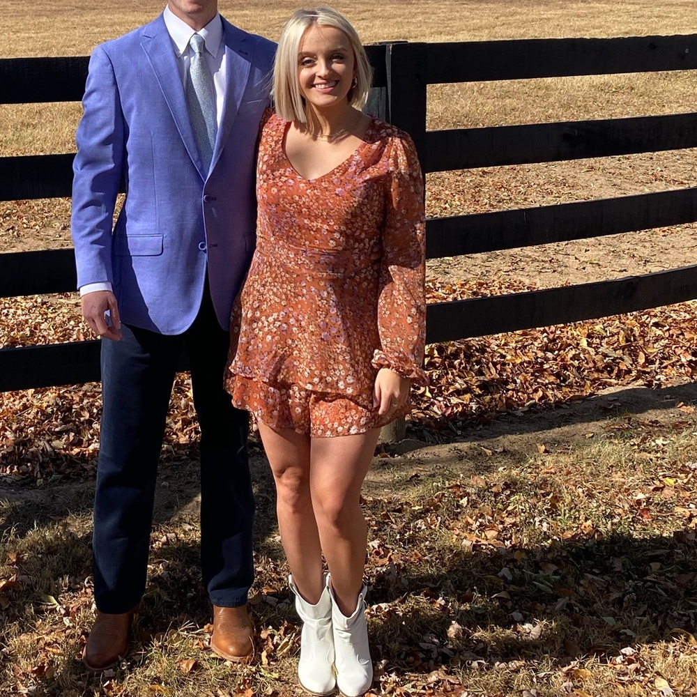 Romper dress that fits like a mini dress. Coral floral romper.